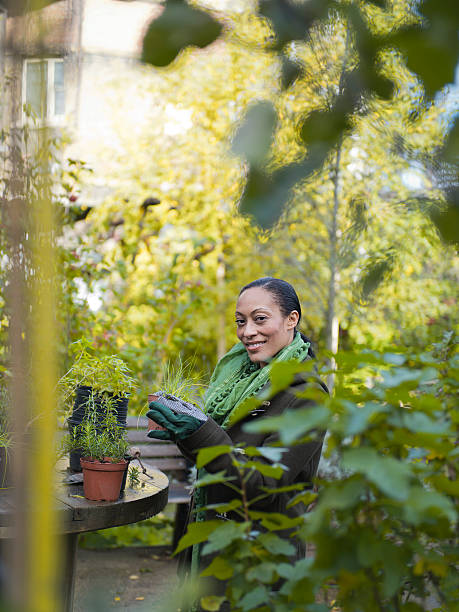 istock Woman in a garden 455850929