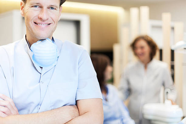 istock Dentist' office doctor smiling at camera. 455851027