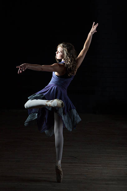 istock Beautiful Ballerina Dancing on Toes 455859171