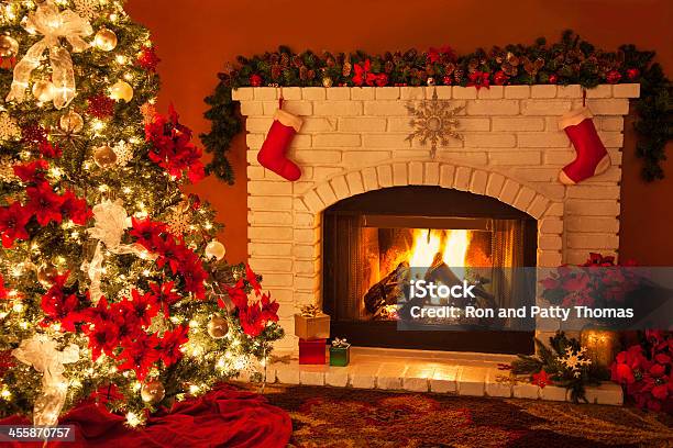 Old Fashioned Christmas Fireplace And Tree Stock Photo - Download Image Now - Christmas, Fireplace, Old-fashioned