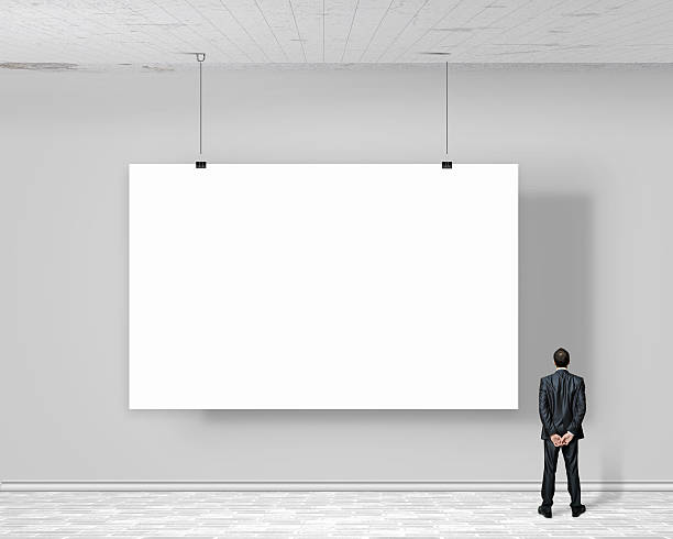 istock Businessman with banner 456014943