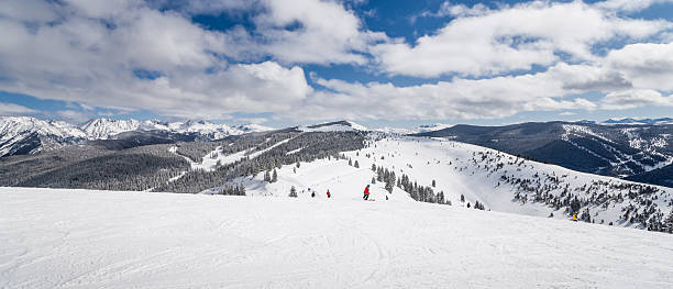 istock Skiing Slopes with Rocky Mountains in Background 456027297