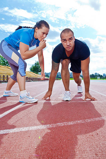 istock Man and woman on the starting line 456033405