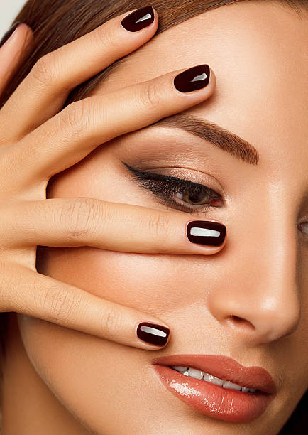 istock Beautiful Woman With Black Nails. Makeup and Manicure. 456040963