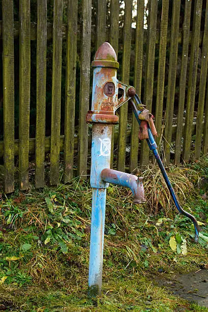 Countryside old water pump in central european country