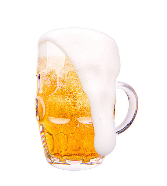 Frosty glass of light beer isolated on a white background