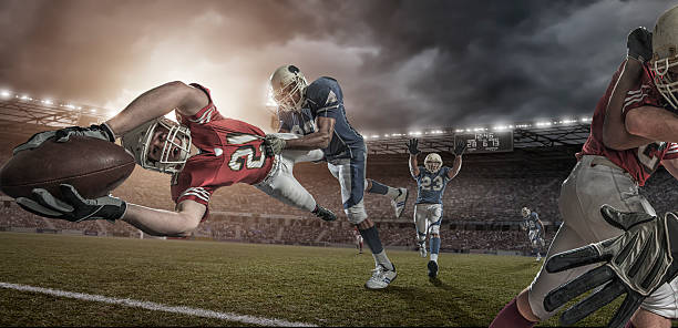 istock American Football Player in Mid Air Touchdown Tackle 456055277