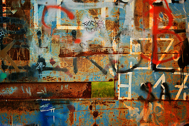 Close up of graffiti A Messy Graffiti Wall Background graffiti brick wall dirty wall stock pictures, royalty-free photos & images