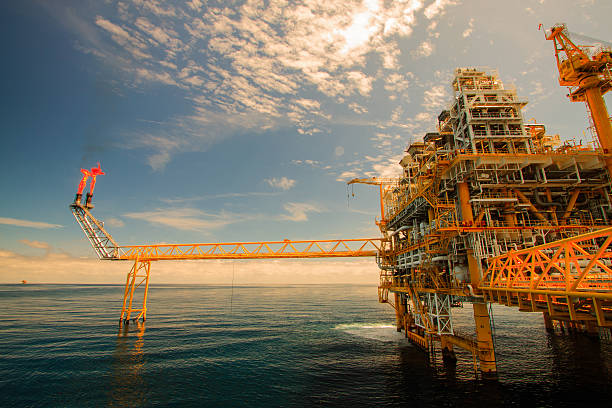 istock Orange oil and rig platform with sunny sky  456066865