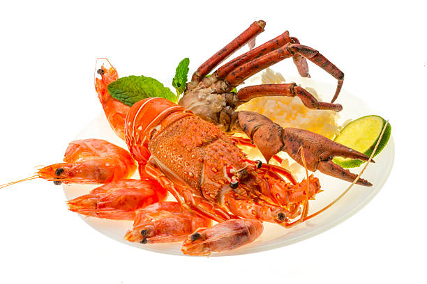 istock Spiny lobster, shrimps, crab legs  and rice 456067179