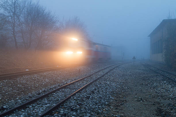 istock Train in the fog 456067867
