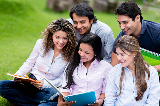 istock Group of students at the park 456067979