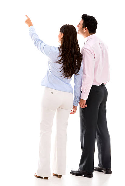 istock Business couple pointing away 456068127