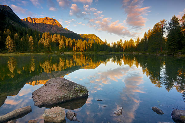 Dolomites, sunrise at Lake San Pellegrino, Trentino, Italy