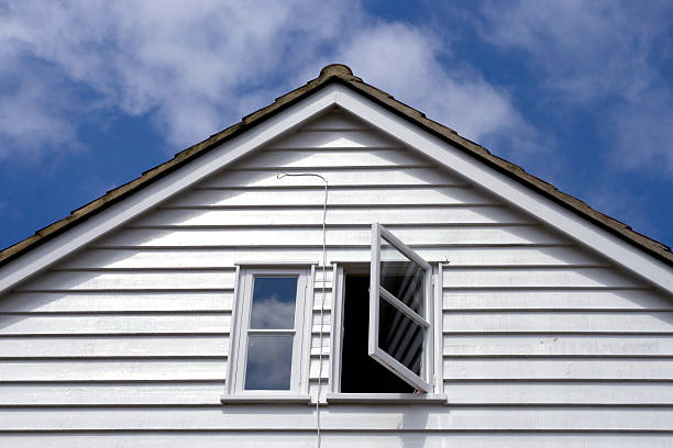Open window An open window on a white clapboard building. gable stock pictures, royalty-free photos & images