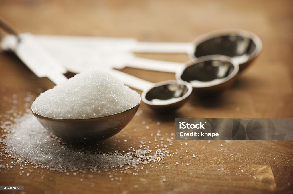 Tablespoon filled with granulated sugar Sugar - Food Stock Photo