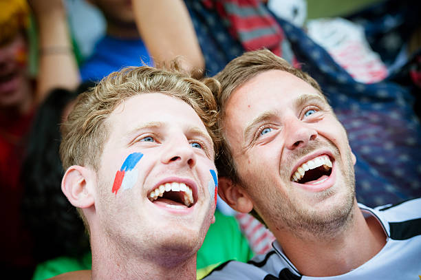istock Fans of different nations at the stadium together 456091247