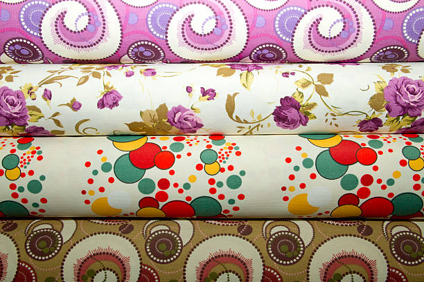 istock Rolled up satin in a fabric shop 456095871