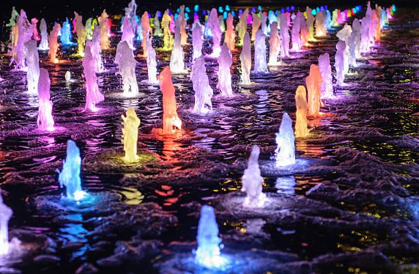 Fountain with coloured lights stock photo