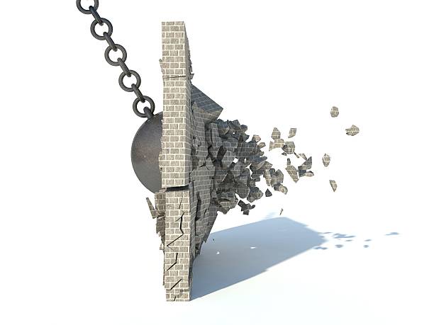 istock destruction of a brick wall 456098803
