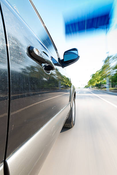 istock car on the road with motion blur background 456098827
