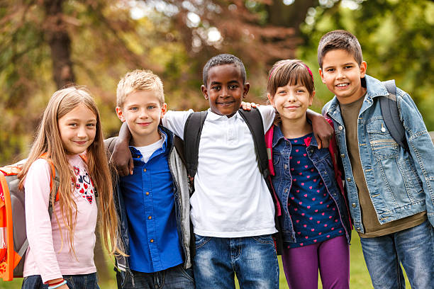 istock Group of happy elementary friends together 456101339