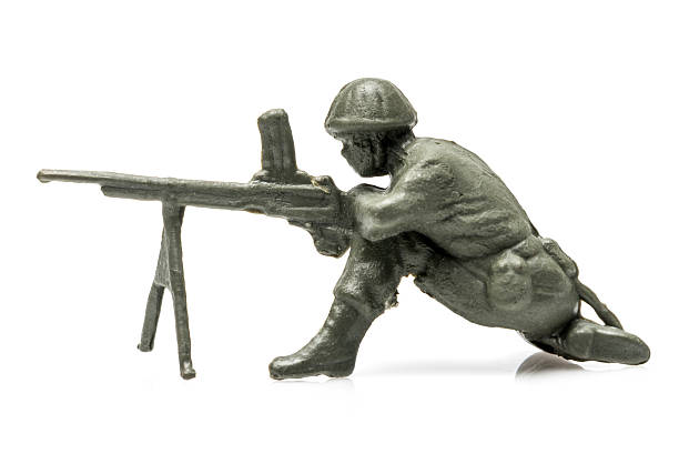 istock Toy solder crouched and firing gun 456101939
