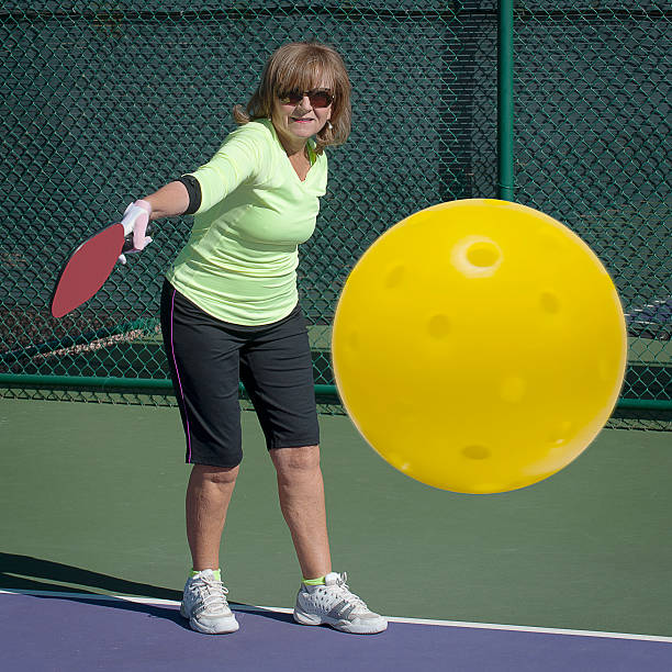 istock Pickleball Action - Senior Woman Hitting Backhand No 1 456105953