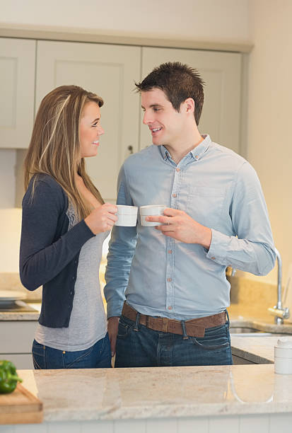 istock Young couple drinking hot beverage 456106179