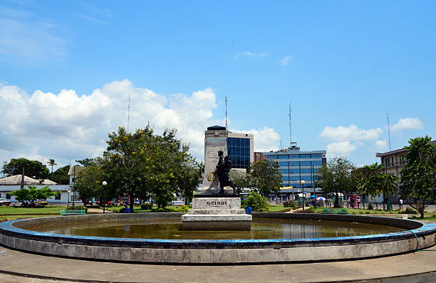 Douala, Cameroon: central square - downtown Cameroon, Douala: colonial heart of the city, the Government Square with the 1919 French monument honouring the death of World War I -  Place du Gouvernement, Le monument aux Morts - photo by M.Torres cameroon stock pictures, royalty-free photos & images