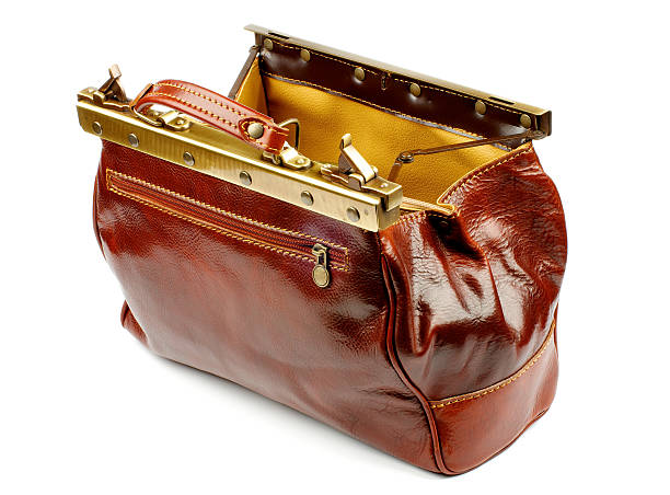 Physician's Bag Open Ginger Expensive Leather Physician's Bag closeup with Gold Details isolated on white background leather medical bag stock pictures, royalty-free photos & images