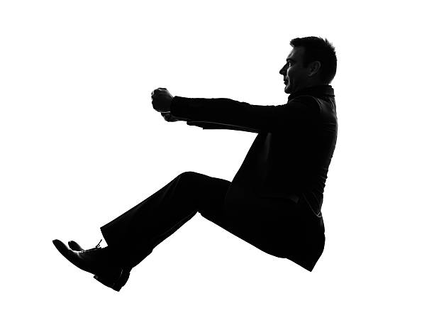 istock business man driving silhouette 456110009