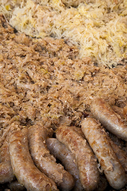 Traditional fried sausages on sauerkraut