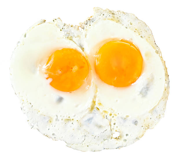 istock top view of two fry eggs on white 456128277
