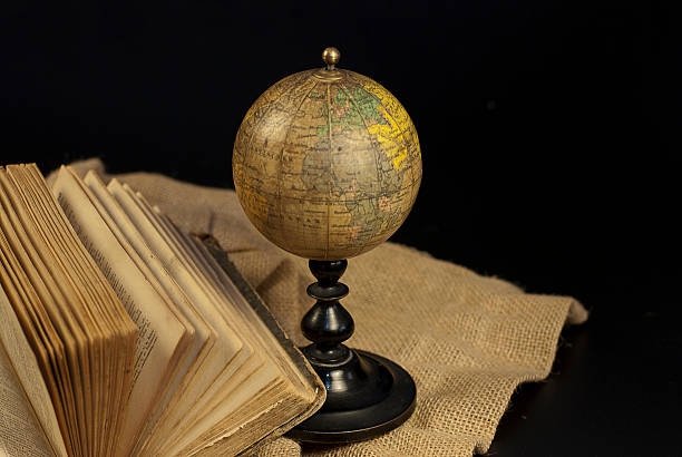 istock vintage globe on a linen cloth 456140581