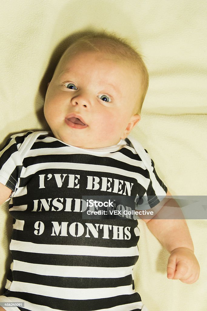 juvenile baby boy prison A cute baby boy in prison outfit Baby - Human Age Stock Photo