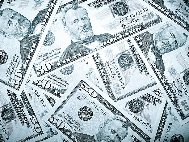 istock heap of fifty dollars 456241201