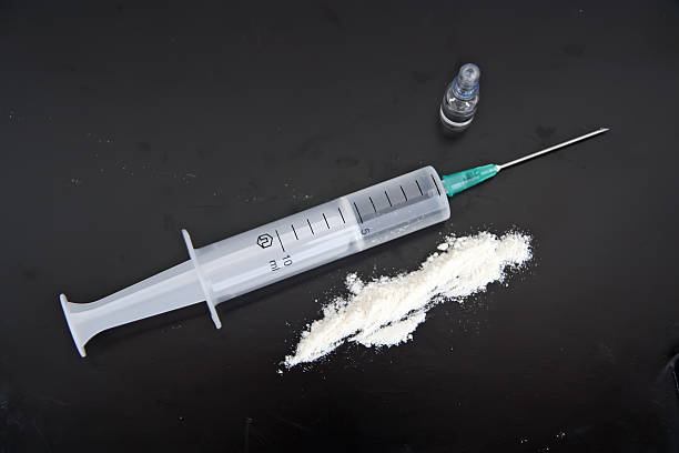 drogue - injecting capsule macro pill photos et images de collection