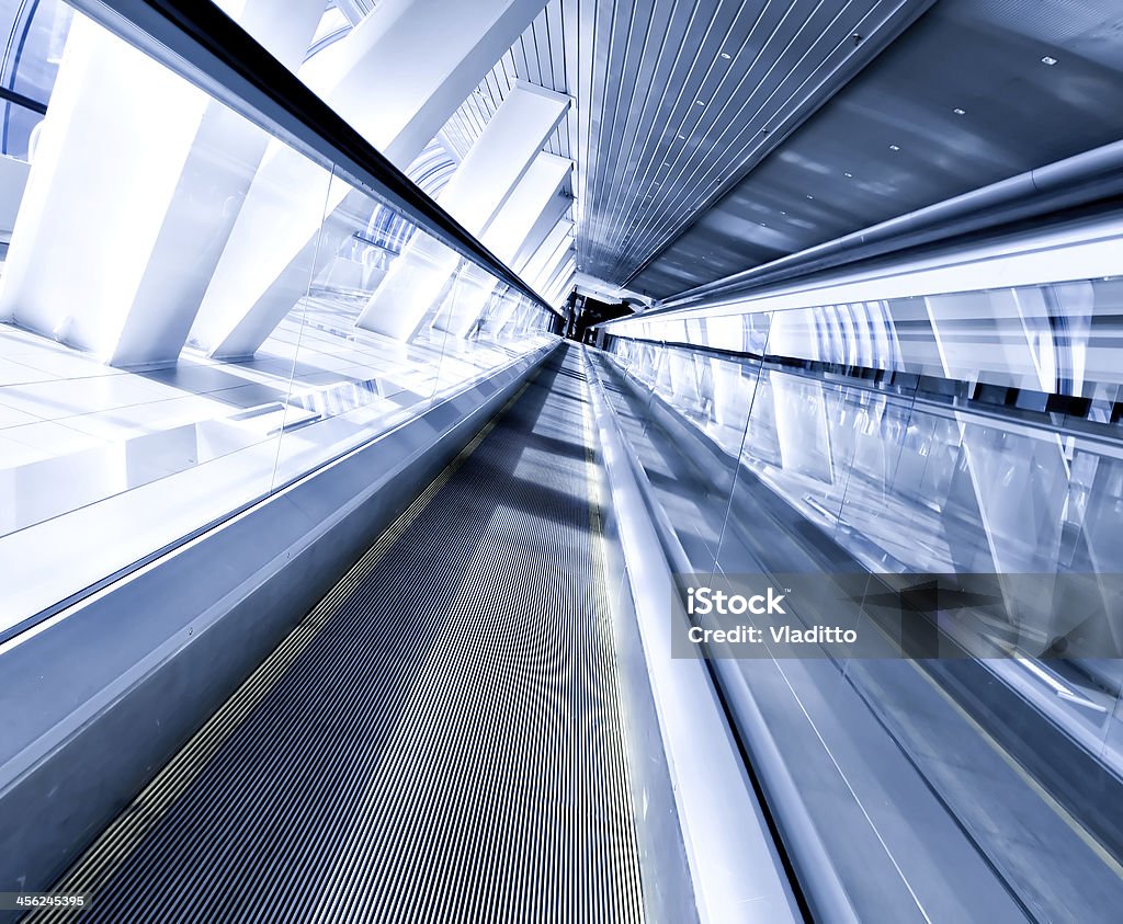 moving escalator in airport Abstract Stock Photo