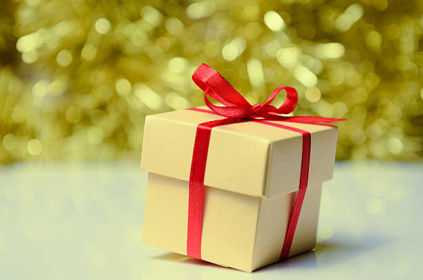istock Gift boxes with red ribbon on abstract holiday background 456258965