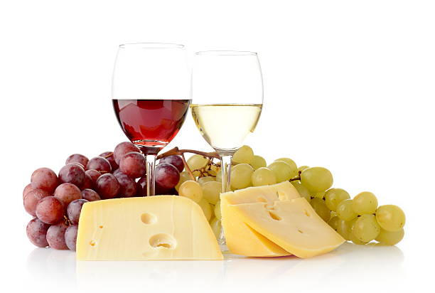 istock Wine and grapes isolated on white with cheese 456264481