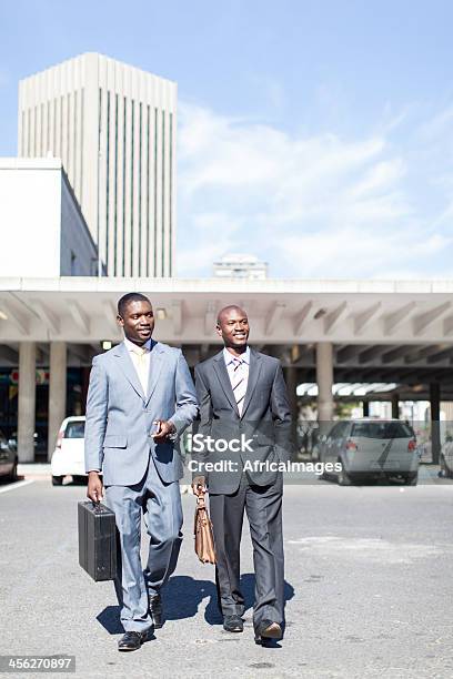 Two African Businessmen On Their Way To The Train Station Stock Photo - Download Image Now