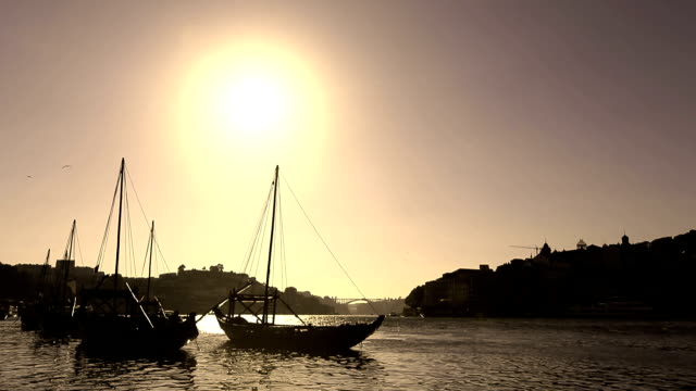 VDO :Silhouette old Porto and traditional boats, Portugal