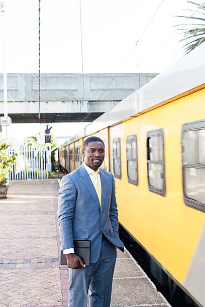 istock African businessman waiting for his train to stop. 456487181