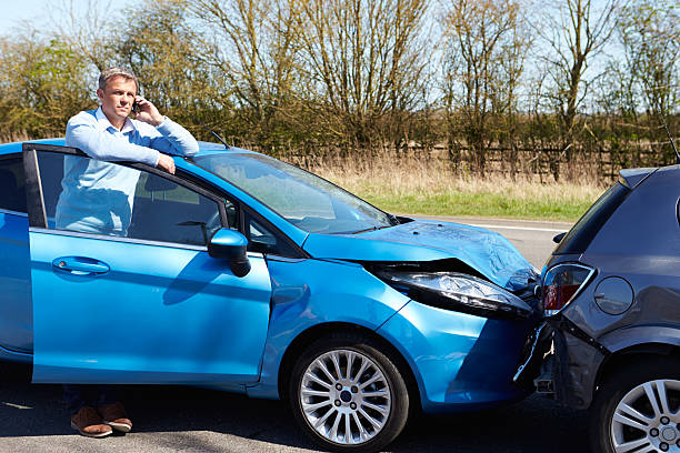 istock Driver Making Phone Call After Traffic Accident 456509003