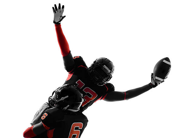istock american football player touchdown celebration silhouette 456518247