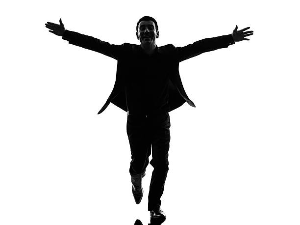 istock business man arms outstretched silhouette 456521715