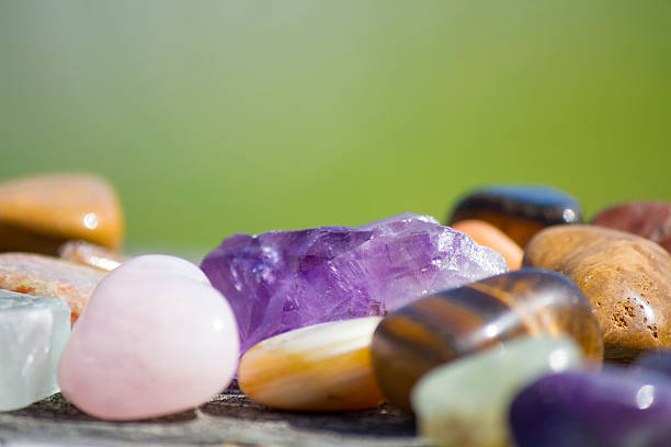 istock Assorted of holistic healing gemstones, focus on Amethyst Crystal 456534037