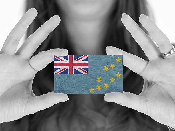 istock Woman showing a business card 456539649
