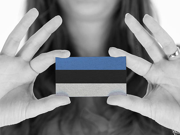 istock Woman showing a business card 456540235